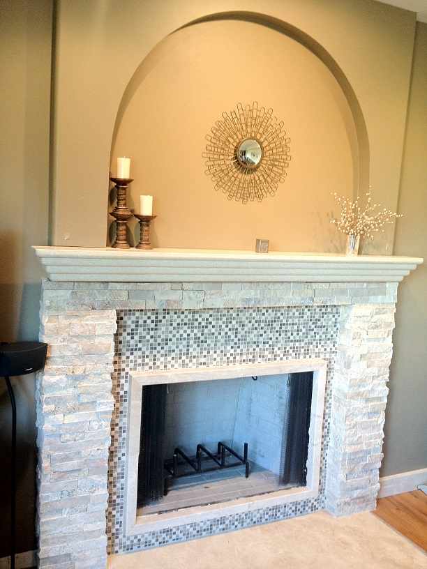 Navajo Stackstone Fireplace with Waterfall Granite Mantel